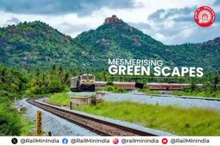 Amidst nature’s embrace, a train gracefully maneuvers a massive curve near Arsikere Jn., Karnataka. #Indian railways