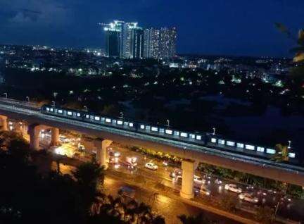 A #Metro on the viaduct near #KaviSukanta Metro station of #OrangeLine