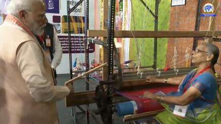 PM Narendra Modi interacts with Women Exhibitors at Lokmata Devi Ahilyabai Mahila Shashaktikaran Mahasammelan in Bhopal