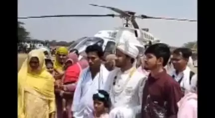 हथीन: हथीन के रूपडाका गांव में युवक ने हैलीकाप्टर से दुल्हन लाकर सबको चौंका दिया, देखने वालों की लगी भीड़
