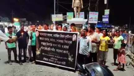 হেমতাবাদ: বিমান দুর্ঘটনায় নিহতদের শ্রদ্ধা জানিয়ে হেমতাবাদে মোমবাতি মিছিল কংগ্রেসের