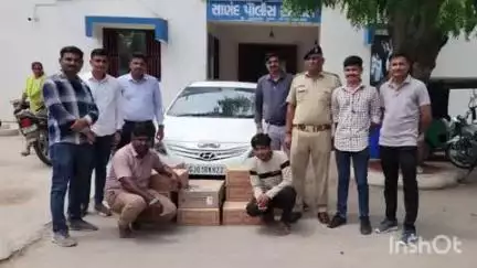 સાણંદ: પિંપણ ગામે કારમાંથી બિયર ટીન અને વિદેશીદારૂની બોટલોના જથ્થા સાથે બે શખ્સોને સાણંદ પોલીસે ઝડપ્યા