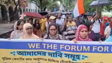 বহরমপুর: শিক্ষক নিয়োগ দুর্নীতির প্রতিবাদে পথে নামল মাদ্রাসার শিক্ষক শিক্ষিকারা, বৃষ্টি উপেক্ষা করে মিছিল ও ডেপুটেশন