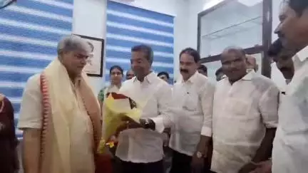 కేడీసీసీ బ్యాంకు చైర్మన్గా మాజీ మంత్రి నెట్టెం రఘురాం విజయవాడలో పదవి ప్రమాణ స్వీకారం