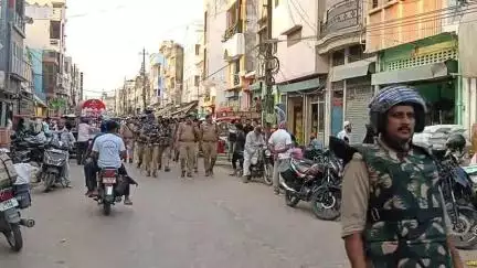 चौक घंटा घर से बकरीद की पूर्व संध्या पर अयोध्या में सुरक्षा बलों ने निकाला रूट मार्च