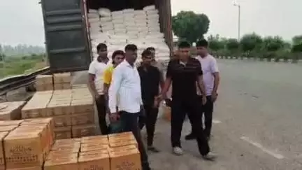 पलवल: केएमपी एक्सप्रेस वे पर गुजरात जा रही अवैध शराब की 240 पेटी कैंटर से बरामद, दो गिरफ्तार