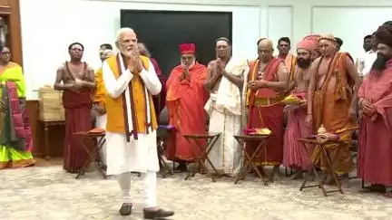 Ahead of the inauguration ceremony of #NewParliamentBuilding, PM Modi takes the blessings of Adheenams at his residence.