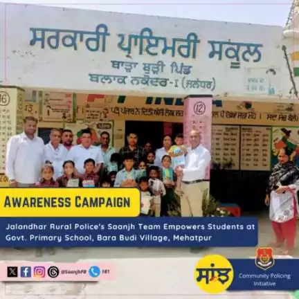 Jalandhar Rural Police's Saanjh Team Empowers Students at Govt. Primary School, Bara Budi Village, Mehatpur with Stationery and Boots, Promoting Awareness on Drug Prevention, Rumor Avoidance, and #Helplines 112, 181, 1091, 1930.