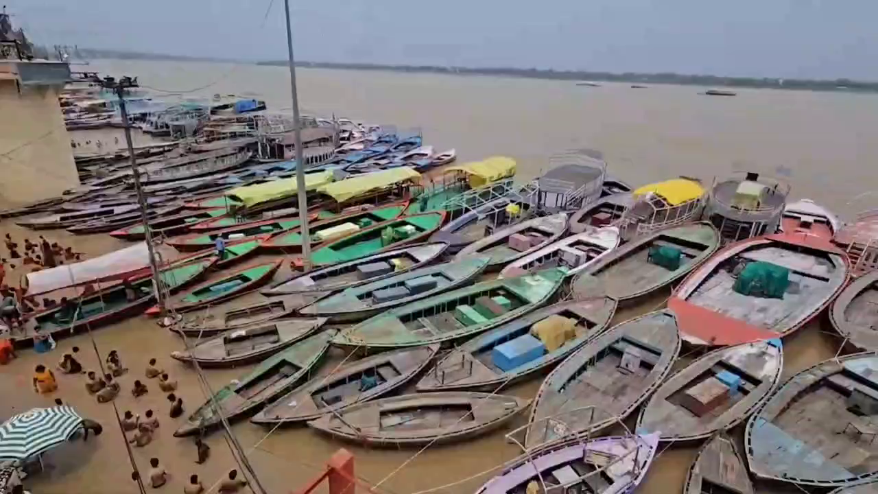 The Ganga's rising water submerged riverside temples. Boat services suspended